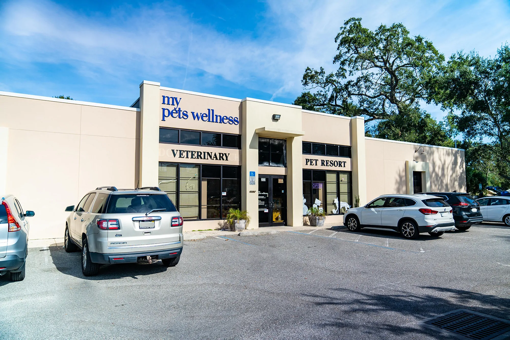 exterior photo of the my pets wellness vet clinic building and parking lot